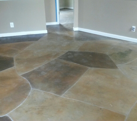 decorative concrete - Warner Robins, GA. Get rid of your old carpet. And create a new feel to rooms for less then the cost of carpet.