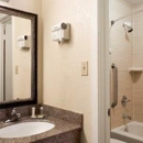 Super 8 by Wyndham Pleasanton - Hotels