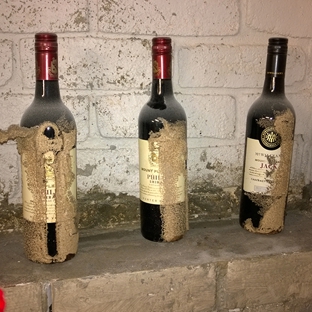 Termitedoc Pest Control - Cardiff, NSW. Termite Working On Wine Bottles