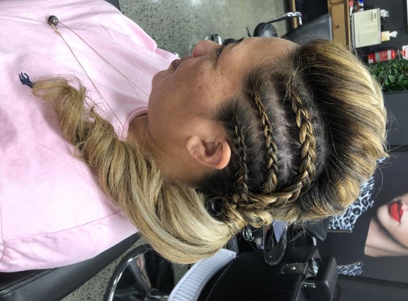 Chipper Hair Pty Ltd - Springfield, QLD. One of my fav up-styles, I call (Viking hair-style).  Awesome braiders too!